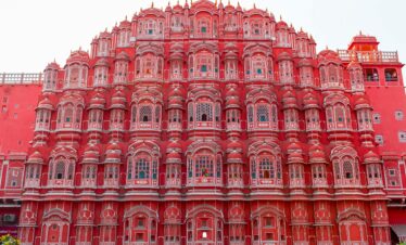 Explore the intricate facade of Hawa Mahal in Jaipur, showcasing its stunning pink architecture and cultural significance.