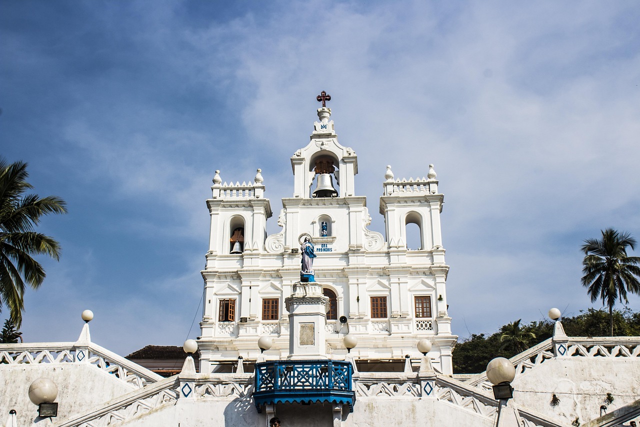 architecture, travel, sky, church, tourism, building, city, religion, outdoors, tower, town, sight, exterior, nature, ancient, house, culture, landmark, traditional, old, goa, historic, attraction, asia, sightseeing, heritage, design, historical, history, destination, blue history, blue culture