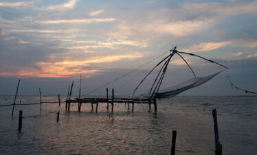 Chinese Fishing_nets_at_sunset,_Kerala,_India